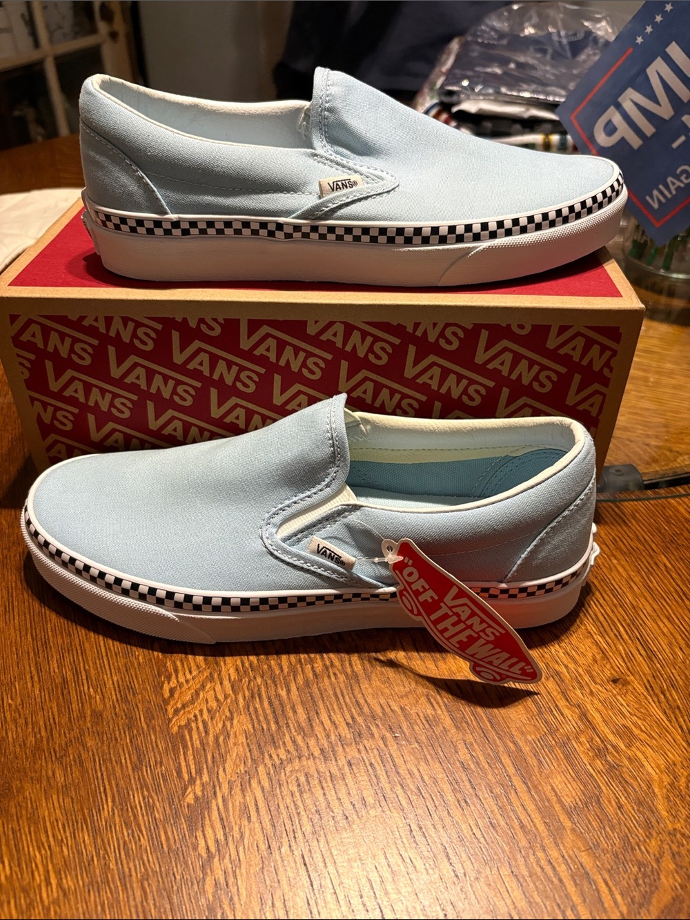 Vans Slip-On Sneakers in Light Blue with Black & White Checker Trim